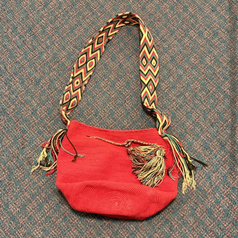 Vibrant Red Woven Shoulder Bag with Patterned Strap